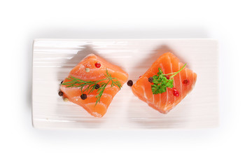 raw salmon fillet on white background