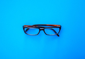 man glasses on blue isolated background