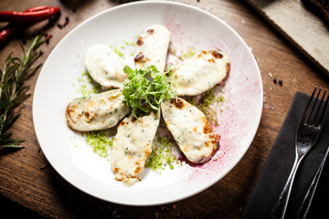Cooked green mussels with parmegano and cream cheese