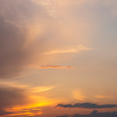 evening sky with clouds beautifully illuminated by the setting sun as a natural background