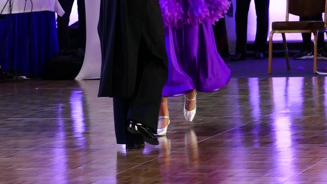 Dancers feet on a parquet floor