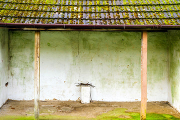 vintage bus stop shelter in village in england uk