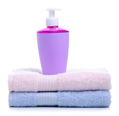 Liquid soap with dispenser with towel, washing and hygiene on white background isolation