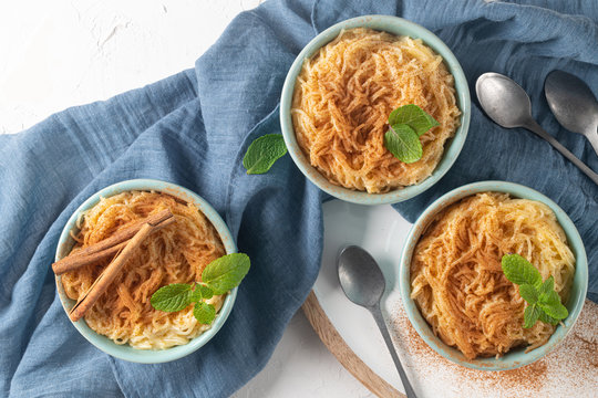 Aletria is a classic Portuguese vermicelli pudding and this is a traditionally served at Christmas time. This is one of the favourites pudding from Portugal. Top view. Flat lay