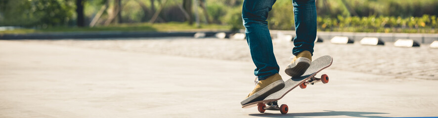 Skateboarder  skateboarding  on parking lot