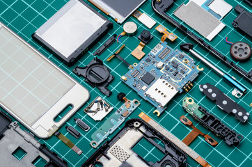 Components of old mobile phone close-up