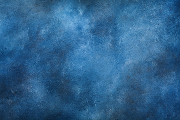 Texture of navy blue painted wall background.