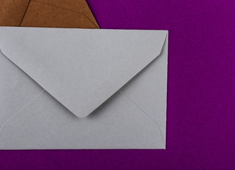 Colorful envelopes on a purple background.