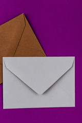 Colorful envelopes on a purple background.