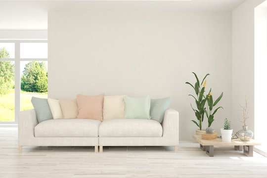 Modern living room in white color with sofa. Scandinavian interior design. 3D illustration