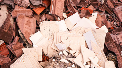  Pieces of concrete, brick and tiles debris from demolished old house on landfill