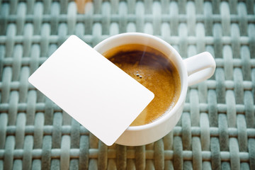 mock up of credit card put near coffee cup