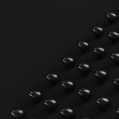 Black eggs on dark background. Minimalism concept