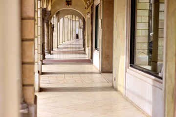 Gallery with arches in the building of classical architecture