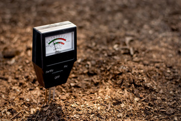 Soil meter is used on loam for planting.