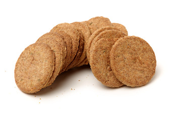 Cookies made of whole grain cereals on a white background