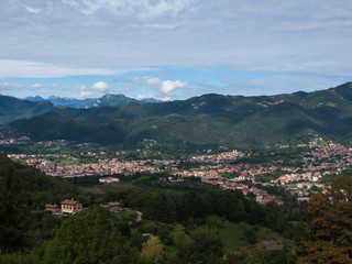 panoramic view of the city, Apennines and the Padan plain from the hill of San Vigilio, Bergamo, Italy