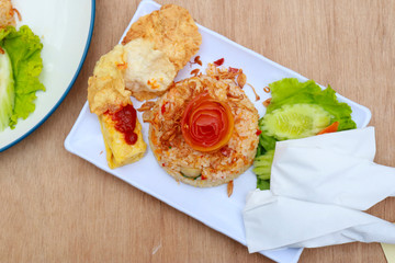 nasi goreng. indonesia fried rice well served on the table