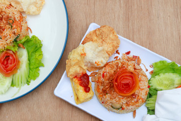 nasi goreng. indonesia fried rice well served on the table