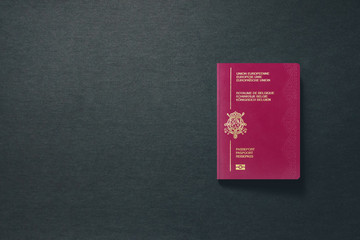 Belgium Passport on dark background with copy space - 3D Illustration