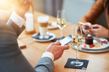 Business people Having Meeting In Cafe