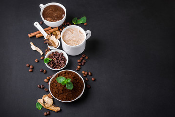 Obraz na płótnie Canvas Mushroom Chaga Coffee Superfood Trend-dry and fresh mushrooms and coffee beans on dark background with mint.