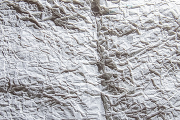 a Crumpled white paper background texture