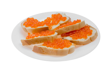 Delicious white bread sandwiches with red caviar on glass plate. Gourmet snack. Healthy seafood. expensive delicacy. Exquisite luxury food isolated on white background