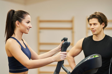 Fit couple at the gym looking very attractive