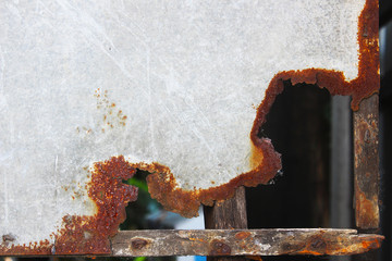 Rusty and broken zinc sheet