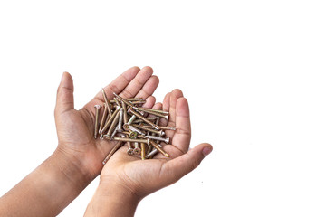 Kid holding metal screws in hands isolated on white background.