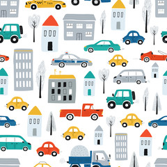 Fototapety  Cute children's seamless pattern with cars, road, houses on a white background. Illustration of a town in a cartoon style for Wallpaper, fabric, and textile design. Vector
