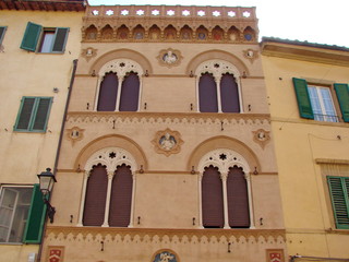 Panorama of ancient Italian buildings on the streets of a medieval town that has been miraculously preserved to this day.