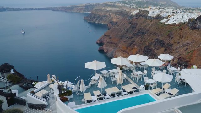 A Beautiful And Majestic View Of A Famous Resort On Top Of Santorini Greece - A Romantic Summer Destination For Lovers - Aerial Shot
