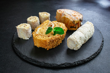 cakes different types (delicious dessert, assorted) menu concept. background. top view. copy save