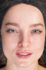 Fototapeta premium beautiful female face close-up