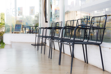 modern steel black chairs in cafe.