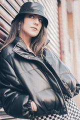 portrait of modern brunette girl in the street