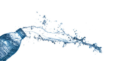 isolated of water splashing form the bottle on white background.
