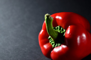 whole red Bulgarian pepper close-up horizontal orientation