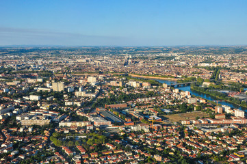 Aerial shot from a plane of the city of Toulouse with Pont Neuf and Saint-Pierre  on a nice late afternoon light 