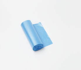Disposable plastic bags for household garbage or waste on a white background