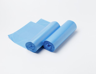 Disposable plastic bags for household garbage or waste on a white background