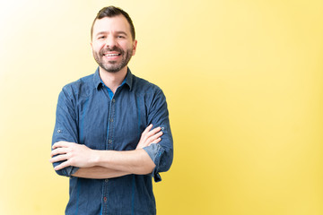 Smiling Adult Man Is With Arms Crossed