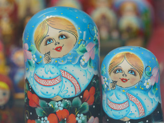 There is a large range of bright colorful Matreshka-dolls (traditional Russian wooden nesting toys)...