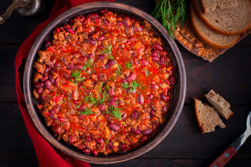 Chili con carne, traditional Mexican dish with beef and beans, top view