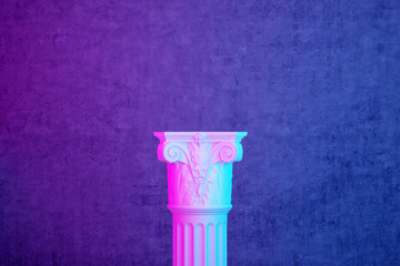 top of an antique column ere concrete wall