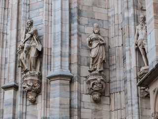 close-up marble sculptures on the walls of Duomo di Milano, Milan, Lombardy, Italy