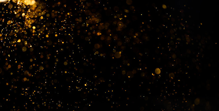 Abstract gold bokeh defocus by neon lights blur background..