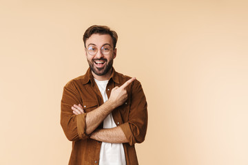 Portrait of a cheerful young arttractive bearded man